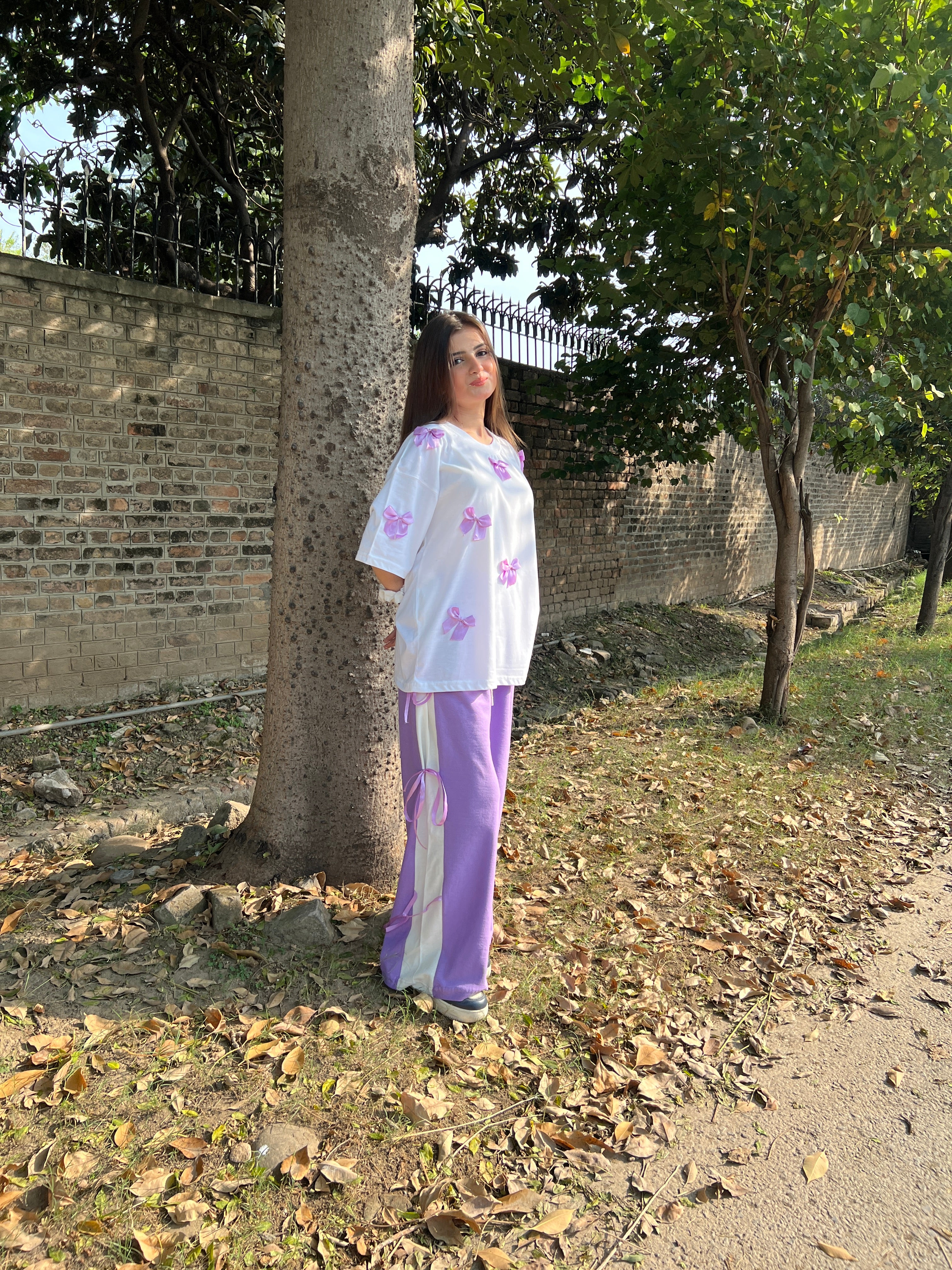Bow All Over Drop Shoulder Tee Paired with Contrast Ribbon Wide-Leg Trousers - Lilac