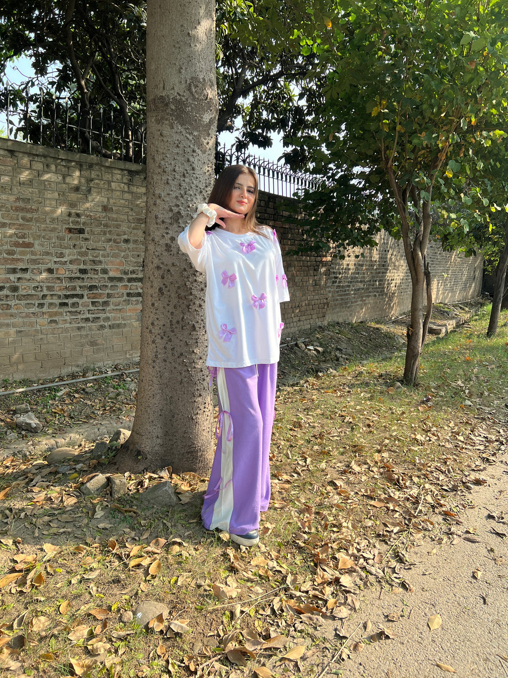 Bow All Over Drop Shoulder Tee Paired with Contrast Ribbon Wide-Leg Trousers - Lilac