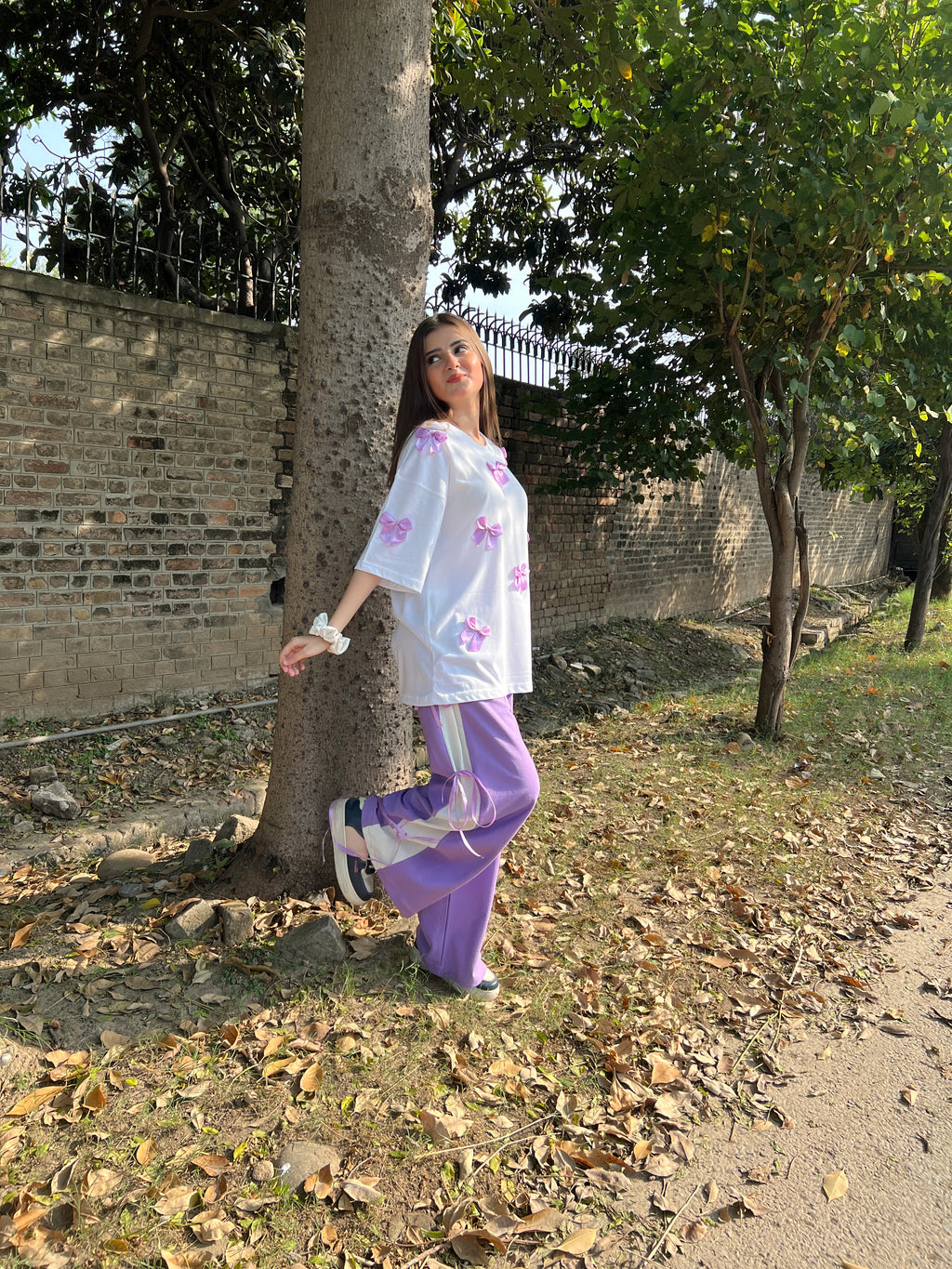 Bow All Over Drop Shoulder Tee Paired with Contrast Ribbon Wide-Leg Trousers - Lilac