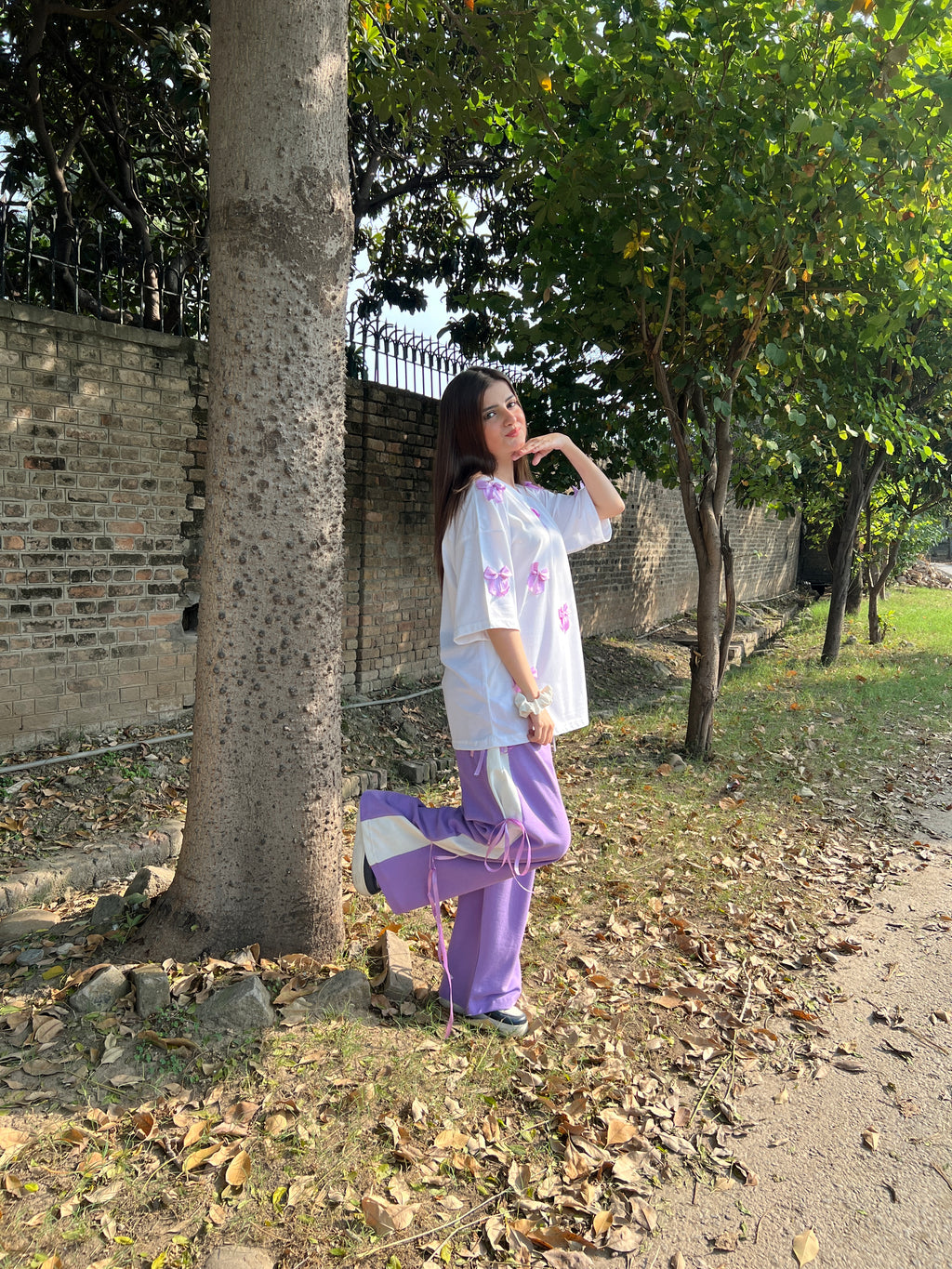 Bow All Over Drop Shoulder Tee Paired with Contrast Ribbon Wide-Leg Trousers - Lilac