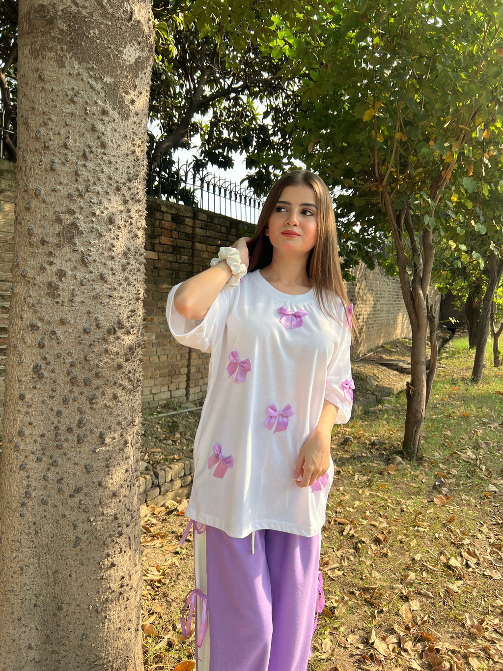 Bow All Over Drop Shoulder Tee Paired with Contrast Ribbon Wide-Leg Trousers - Lilac