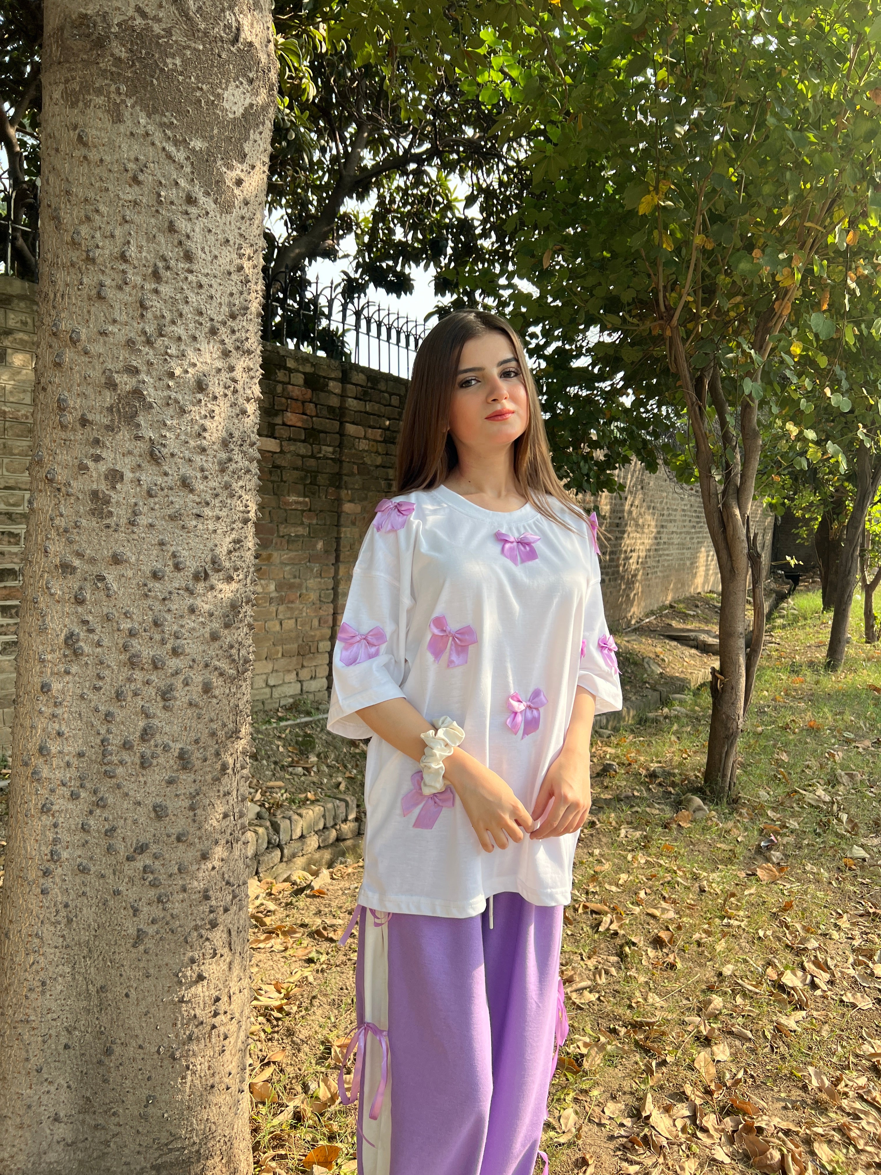 Bow All Over Drop Shoulder Tee Paired with Contrast Ribbon Wide-Leg Trousers - Lilac