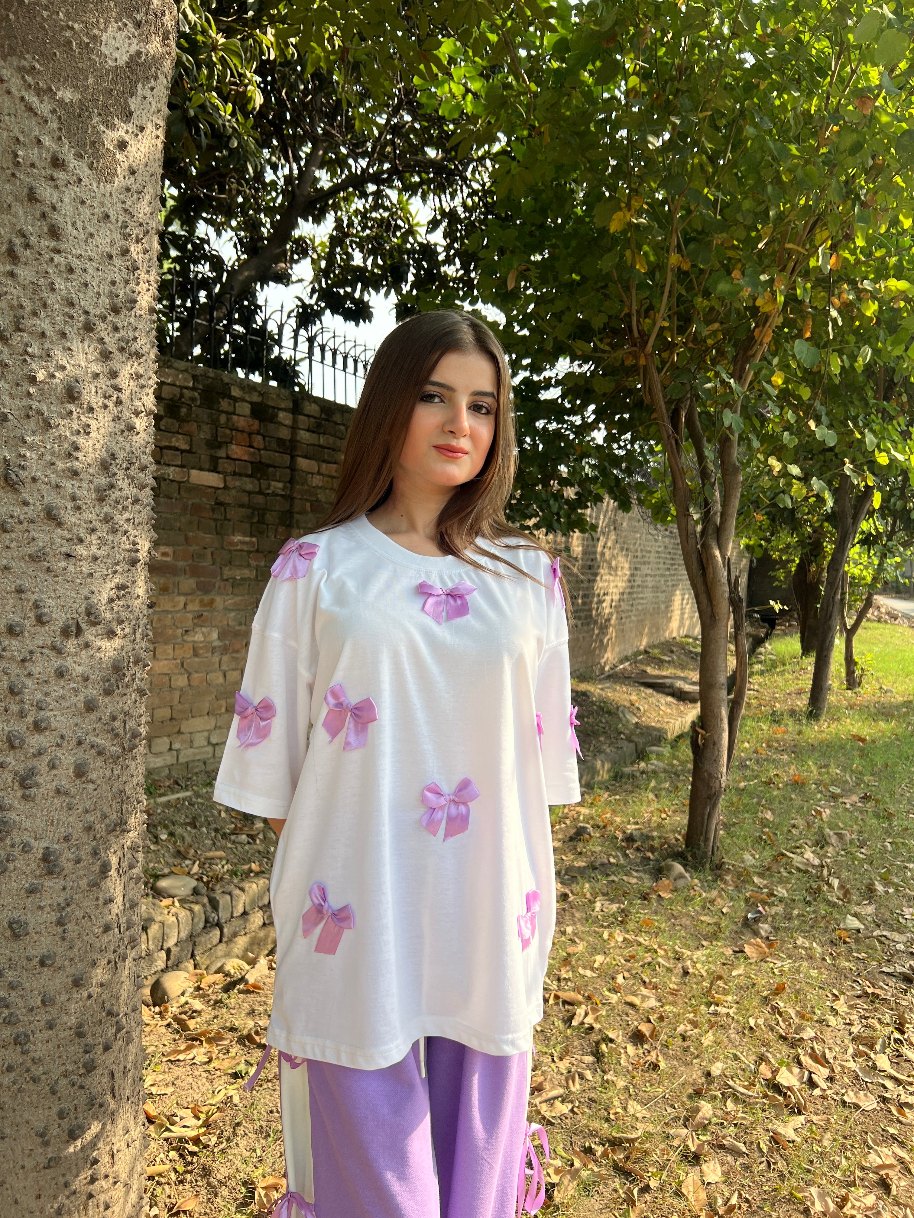 Bow All Over Drop Shoulder Tee Paired with Contrast Ribbon Wide-Leg Trousers - Lilac