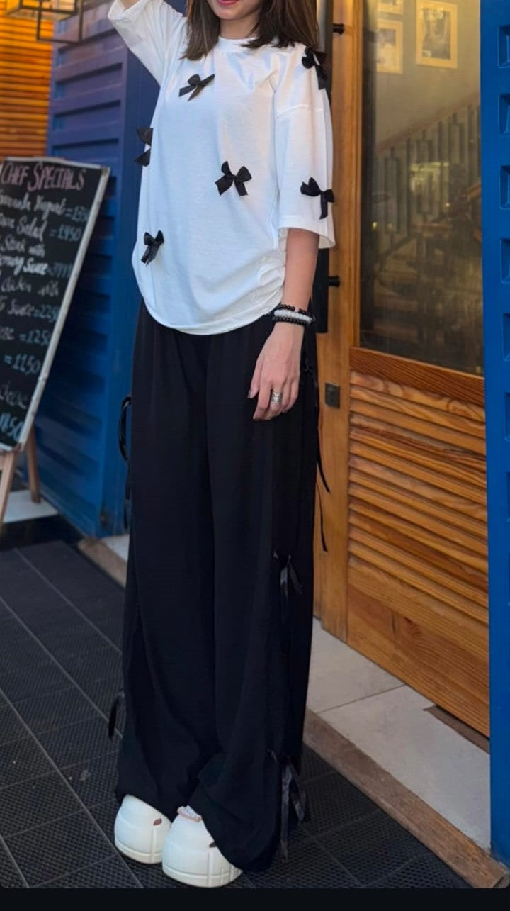 Bow All Over Drop Shoulder Tee Paired with Ribbon-Tied Wide-Leg Trousers