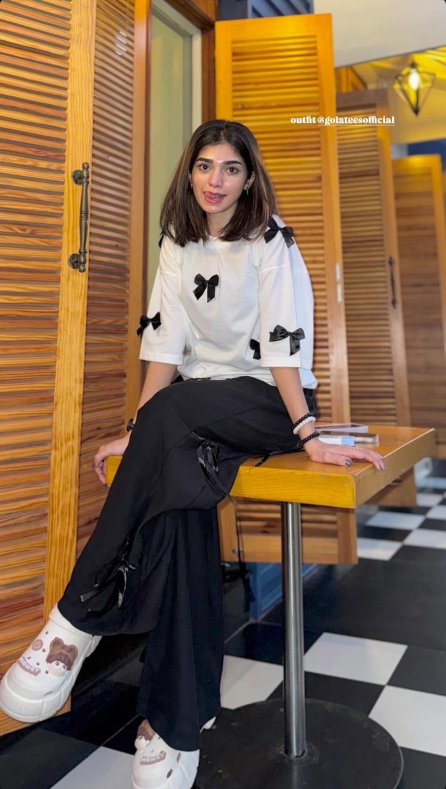 Bow All Over Drop Shoulder Tee Paired with Ribbon-Tied Wide-Leg Trousers