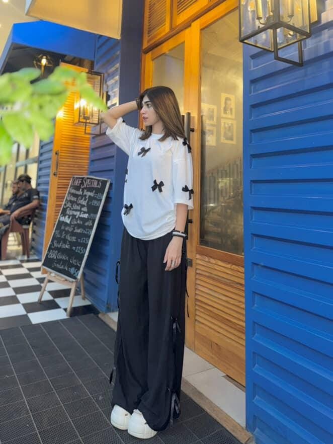 Bow All Over Drop Shoulder Tee Paired with Ribbon-Tied Wide-Leg Trousers