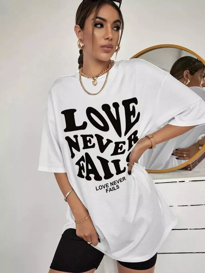 LOVE NEVER FAIL GRAPHIC OVERSIZED DROP SHOULDER TSHIRT